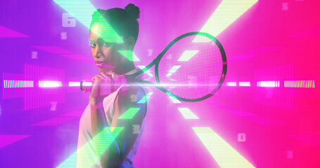 Fototapeta na wymiar Side view of biracial female tennis player with racket standing over illuminated light beams