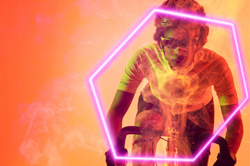 Fototapeta na wymiar Hexagon neon over determined african american cyclist riding bicycle against orange background