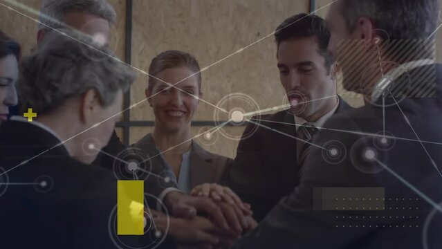Animation of communication network over happy male and female business colleagues stacking hands