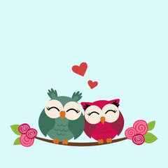 Greeting card with two cute owls in love sitting on flower branch for Valentine's day or wedding congratulations.