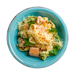 fettuccine with salmon and parmesan top view isolated on white background