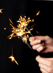 hand holding sparkler
