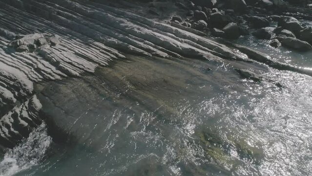 water flowing into the river