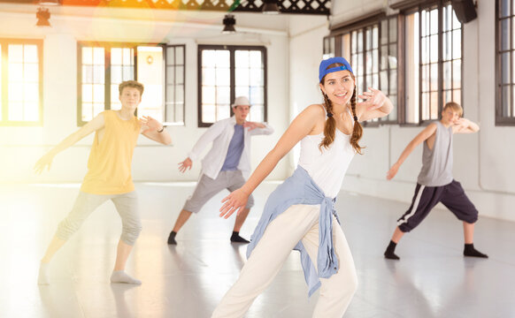 One Young Lady And Few Boys Dancing Modern Dance On Rehearsal