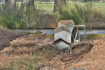 Dethridge Irrigation water wheel used to measure water flow that is no longer in use.