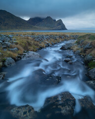 River Flowing towards sea, Unstad, Lofoten Islands, Norway