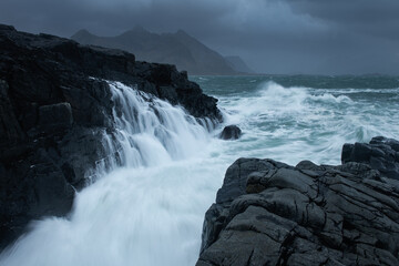 Waves crashing over rocks, Lofoten Islands, Norway