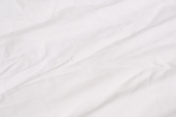 Texture of white cotton crumpled fabric