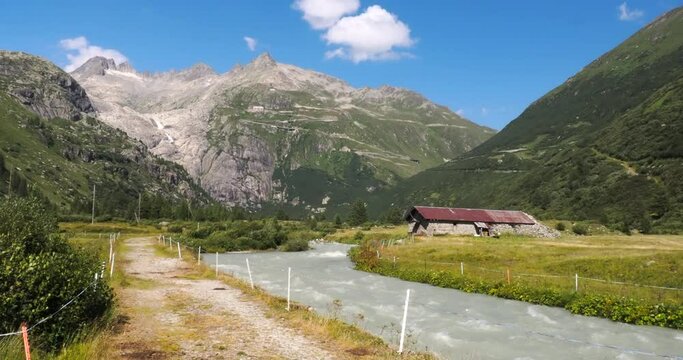 River Rhone and a view at the Rhone glacier from village Gletsch in Switzerland