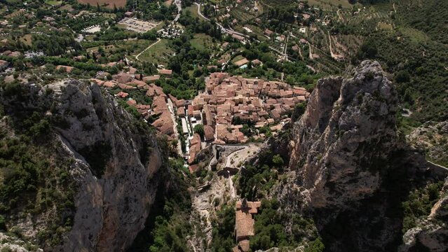 The village of Moustiers-Sainte-Marie, seen from above the limestone cliff