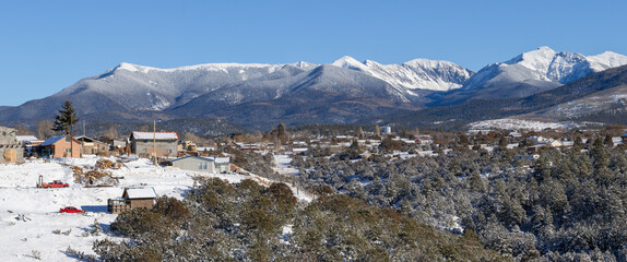Snowy panorama of the town of Truchas, New Mexico and the Sangre de Cristo Mountains along the High...