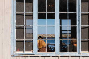 People eating in an oceanfront restaurant, Rockport, Massachusetts, USA