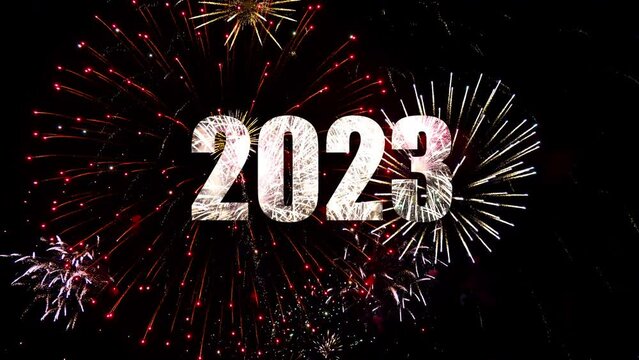 Happy New Year 2023 seasonal background illumination video, fireworks in midnight sky. Firework sparkler, bengal and christmas lights