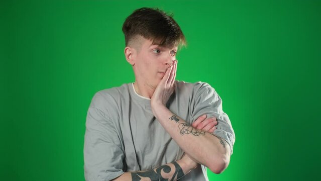 Worried man doing face-palm gesture