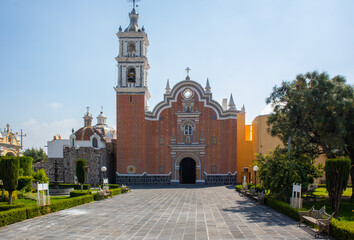 Fototapeta premium church of tlaxcalancingo, puebla, mexico, front view of a touristic mexican landmark
