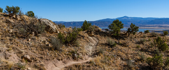 Fototapeta na wymiar Panorama of Chimney Rock Trail and desert landscape at Ghost Ranch