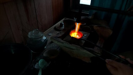Goldsmith working on his workbench. Production and making process precious gold jewelry, jewels, ring jeweler, goldsmith in workshop.