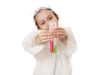 Details: test tubes with red and green chemical liquids, in the hands of smart schoolgirl in lab coat, conducting scientific experiment and showing the ongoing reaction to the camera, white background
