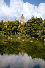 Fototapeta premium Ancient buildings and beautiful lakes in Santa Park, Dali City, Yunnan Province, China