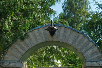 A fragment of the arch of the gate of a private house. Moscow region. Russia