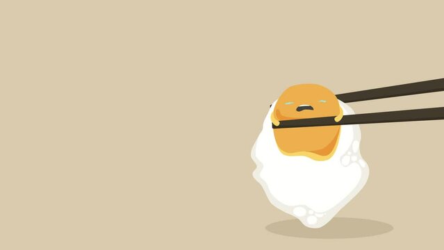 A pair of chopsticks holding an egg