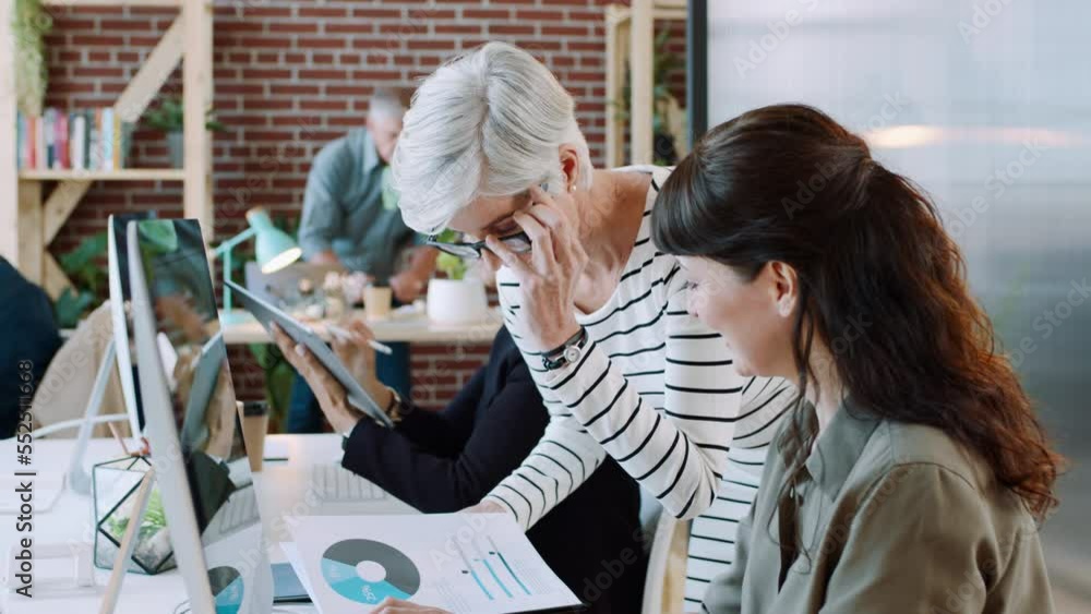 Aufkleber manager helping woman at computer with documents, data report and business proposal for ideas, plann