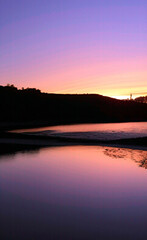 Obraz premium sunset over the river