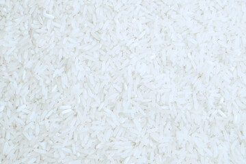 White uncooked milled rice as a background. Top view.