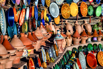 A set of traditional, handmade Moroccan clay dishes. Bowls, plates, tagines, jugs.