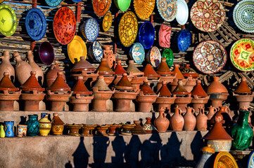 A set of traditional, handmade Moroccan clay dishes. Bowls, plates, tagines, jugs.