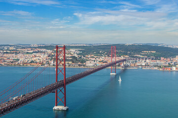 The 25 de Abril Bridge is a bridge, Lisbon Portugal