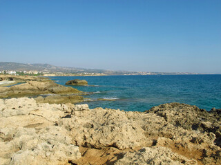 Fototapeta na wymiar Seashore and small lagoon. Rocky Mediterranean coast.