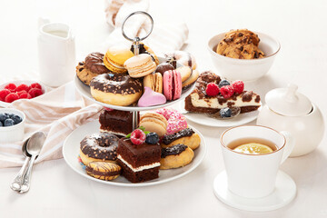 Afternoon tea stand with sweet treats.