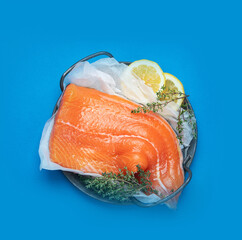 Salmon. Healthy food on color background