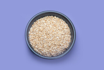 Oatmeal on color background