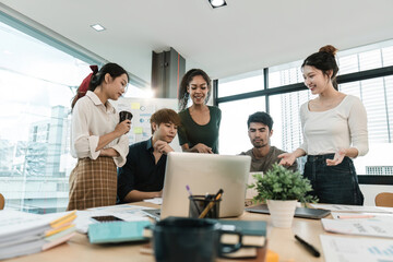 Young asian people having business meeting in office. teamwork brainstorming planning meeting concept