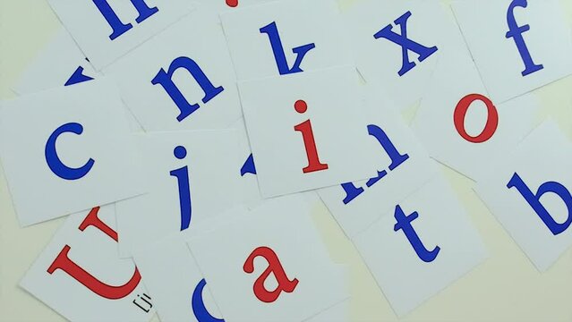 English cards with letters to learn. Selective focus.