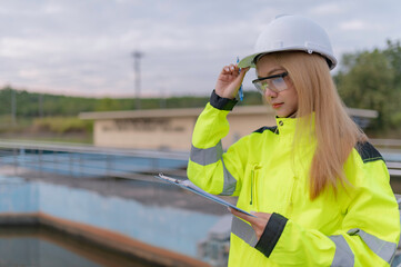 Environmental engineers work at wastewater treatment plants,Water supply engineering working at Water recycling plant for reuse