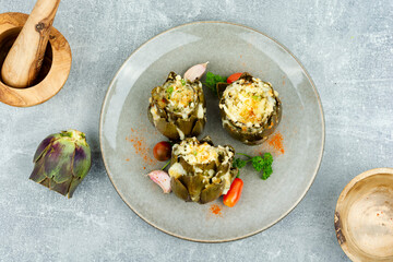 Cooked artichokes with parmesan