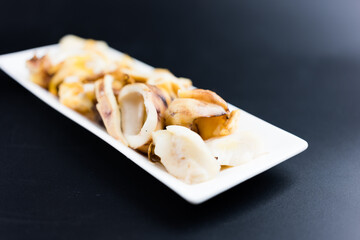 Grilled stuffed squid. Thai seafood sauce.