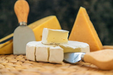 Cheese is on the table. Selective focus.