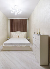 white bed in the white bedroom brown curtain. Light style