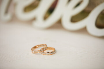 beautiful wedding rings on a light background