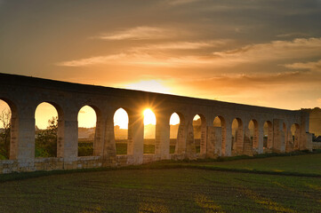 Sunset at the Gozo Aqueduct, an aqueduct on the island of Gozo, Malta. It was built by the British...