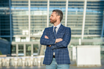 confident ceo in formalwear. adult ceo outdoor. ceo in jacket. caucasian ceo standing outside