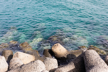 Sea and rocks at  Las Palmas de Gran Canaria bay, Spain.