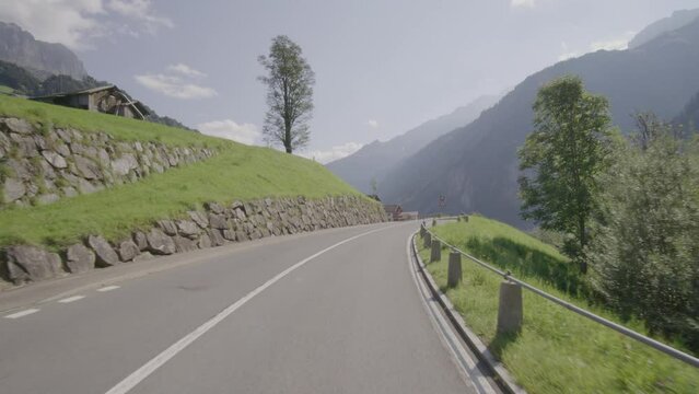 Driving video of the Sustenpass in Switzerland. The Susten pass is a famous alp road and has a scenic mountain panorama. View from the car. Experience calming nature and exciting pass roads.