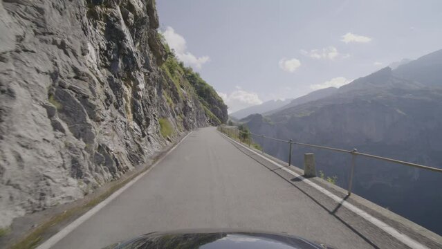 Driving video of the Sustenpass in Switzerland. The Susten pass is a famous alp road and has a scenic mountain panorama. View from the car. Experience calming nature and exciting pass roads.