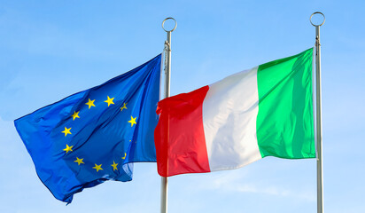 Two waving flags of ITALY and EUROPEAN UNION