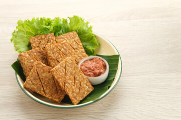 Tempeh, Tempe Goreng or Fried tempeh is Indonesia traditional food, made from fermented soybean...